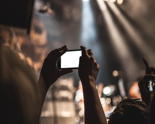 Smartphone displaying the InfiniteZoneCrown Australian hotel and gaming event guide